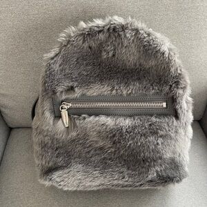 new Charles and keith fur back pack
